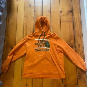 orange north face men’s hoodie
